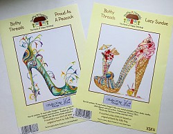 Peacock and Lazy Sundae cross stitch kits.